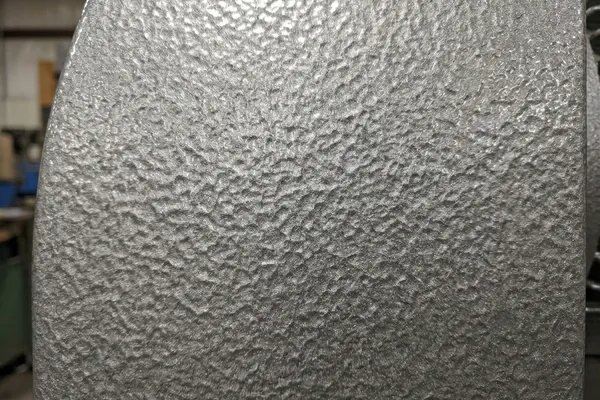 Hammertone silver textured powder coating on machinery cover